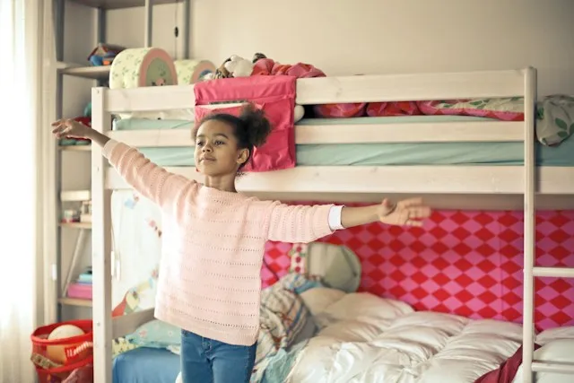 kid Making Their Bed and Tidying Their Room