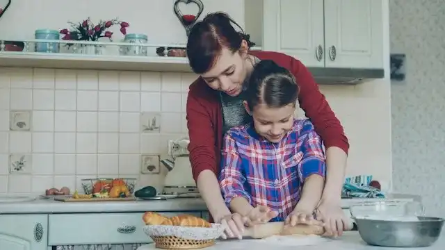 caring mother supporting a child